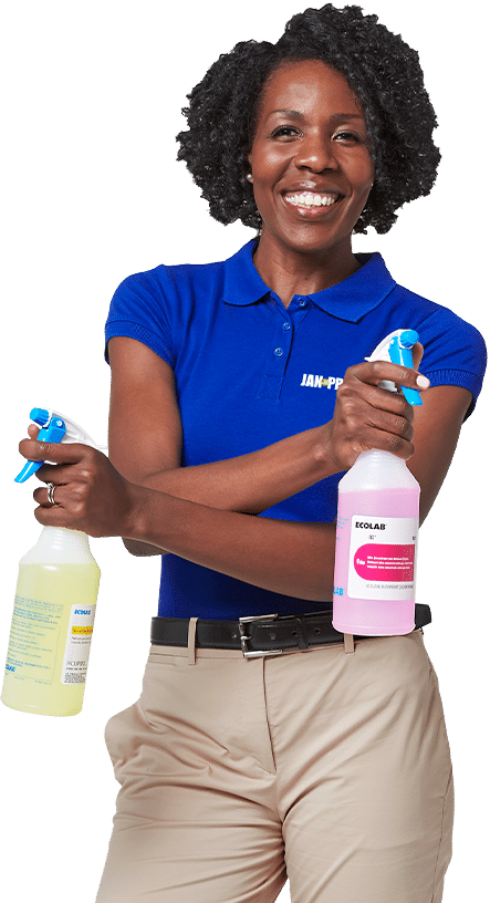 an African-American woman smiling in JPSI attire holding 2 spray bottles