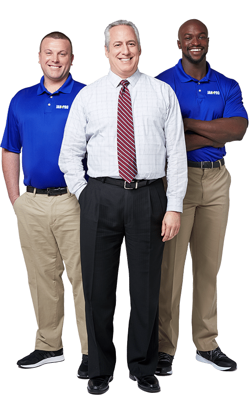 a Caucasian Banker posing with a Caucasian and African-American JAN-PRO Cleaning & Disinfecting employees smiling