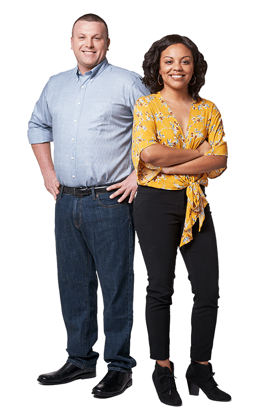 a man and woman posing and smiling