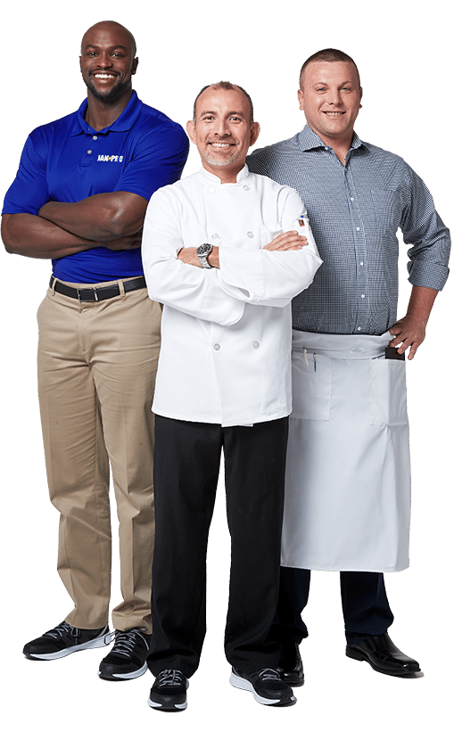 An African-American man in JAN-PRO Cleaning & Disinfecting attire and two Caucasian chefs posing