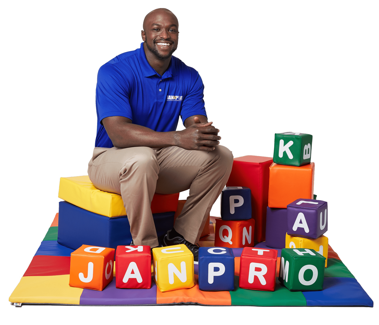 An African-American man JAN-PRO Cleaning & Disinfecting employee with daycare blocks lettering