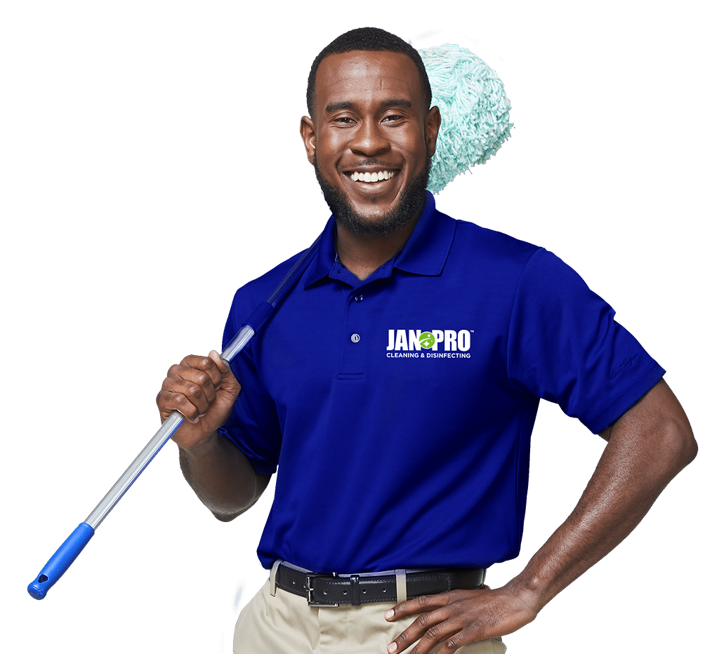 commercial cleaning expert holding a mop
