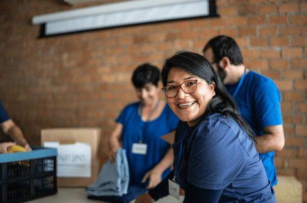 Happy coworker smiling in an office.