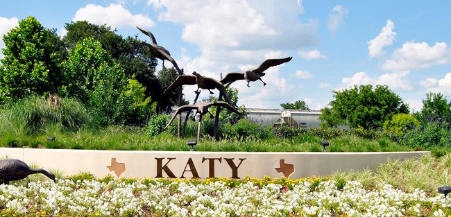 sign and statue in Katy, TX