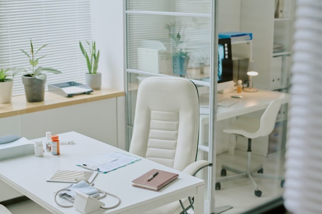 Clean office with items organized on a desk.